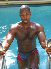 Straight black guy shows his biceps