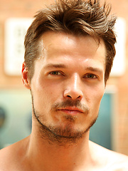 Adam Dacre plays with his long, curved, uncut dick