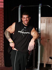 Super-muscled gay model Zeb Atlas posing in the gym