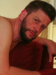 Rough and raw daddy Randy Scott poses for a series of sexy photos of his hairy, natural body and his fat, rigid cock